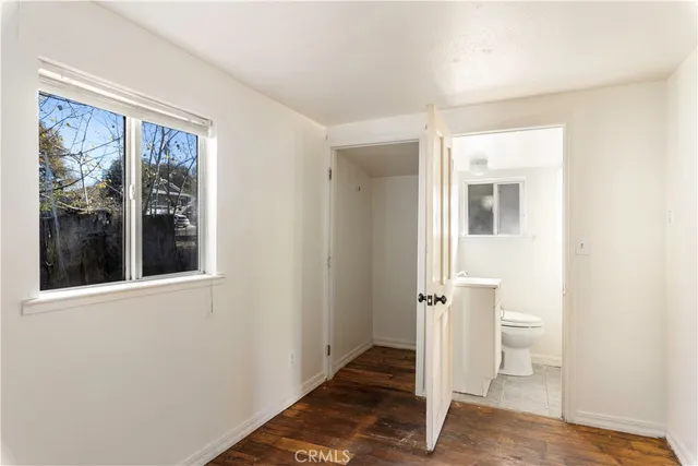 a view of a bathroom with a toilet
