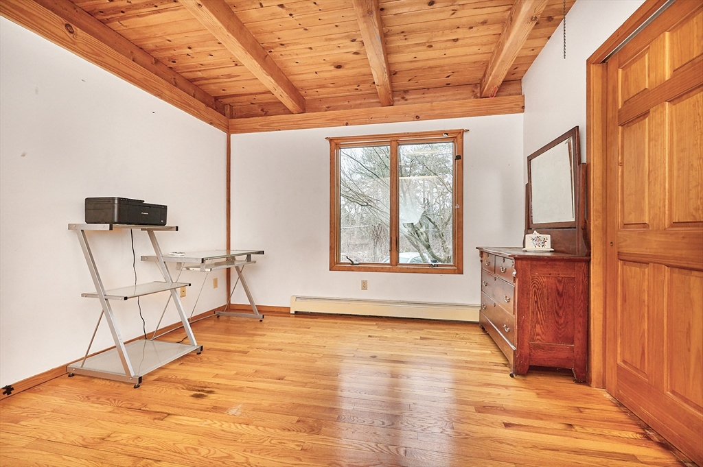 130 Coles Meadow Road Northampton, MA 01060 - Photo 14 of 42 a view of an empty room with a window