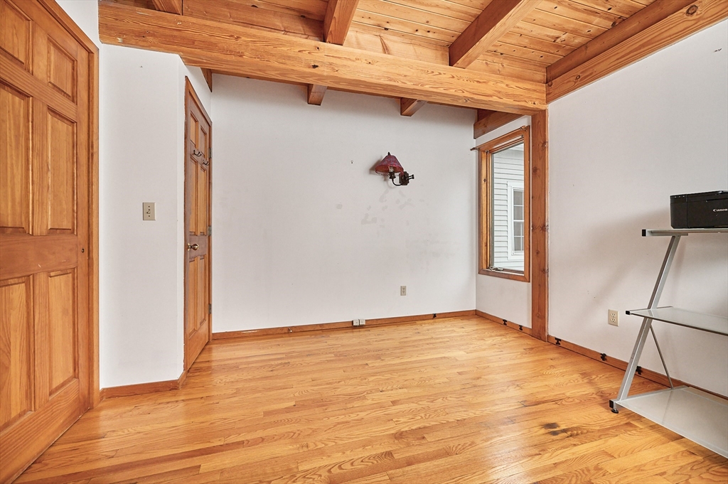 130 Coles Meadow Road Northampton, MA 01060 - Photo 15 of 42 a view of a room with wooden floor and cabinet