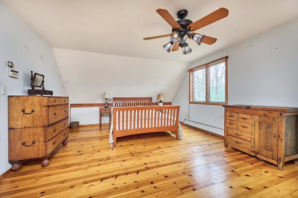 130 Coles Meadow Road Northampton, MA 01060 - Photo 18 of 42 wooden floor in an empty room with a window