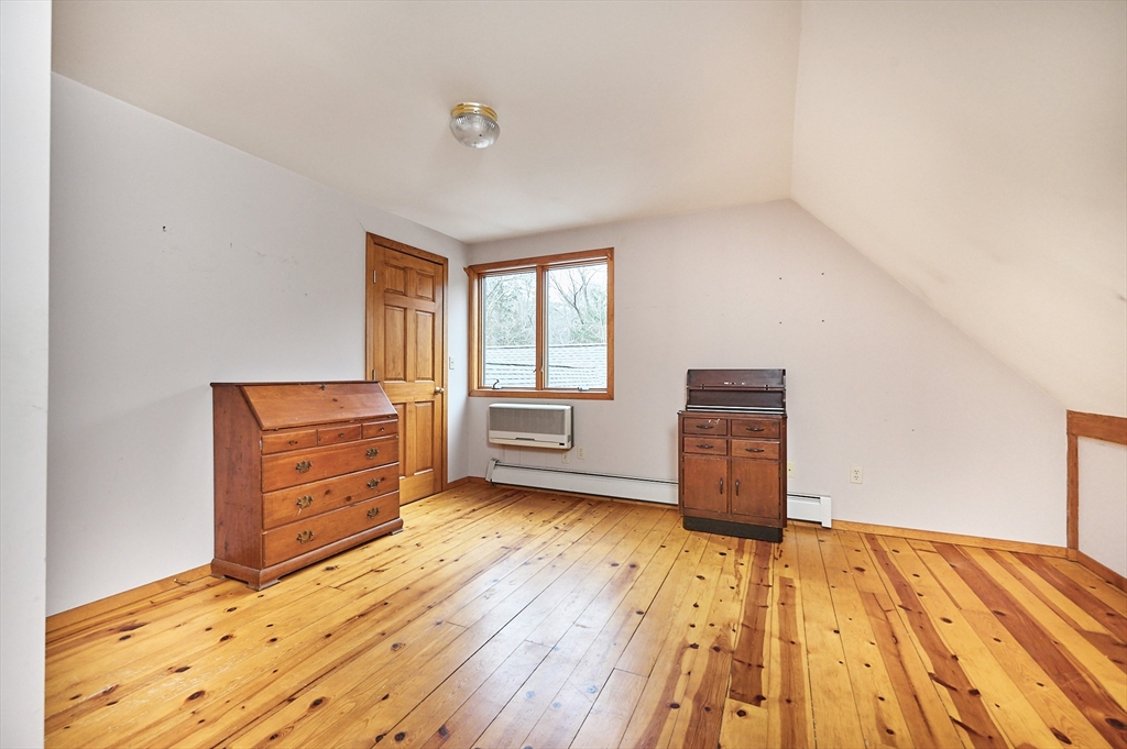 130 Coles Meadow Road Northampton, MA 01060 - Photo 21 of 42 a bedroom with a bed and a dresser