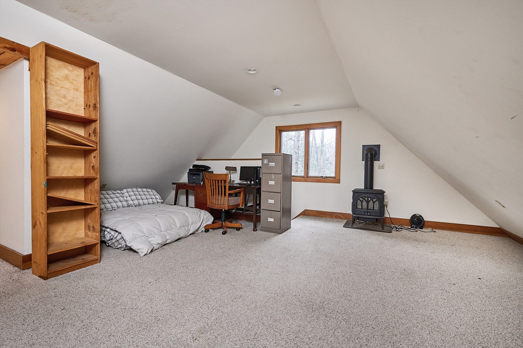 130 Coles Meadow Road Northampton, MA 01060 - Photo 25 of 42 a bed room with furniture and a window