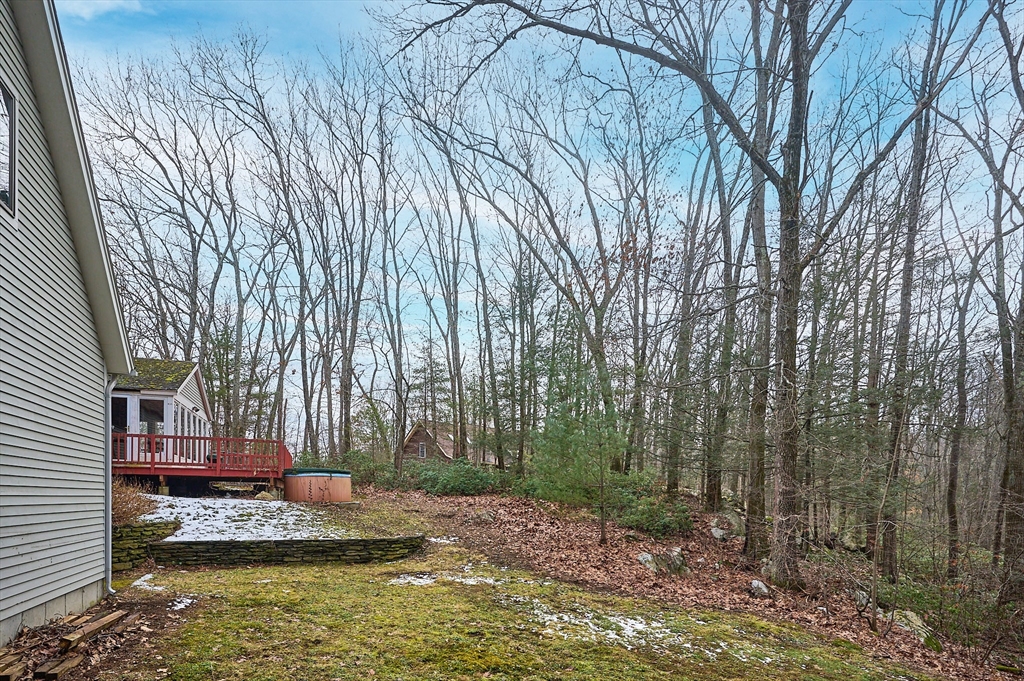 130 Coles Meadow Road Northampton, MA 01060 - Photo 32 of 42 a view of a lake with large trees
