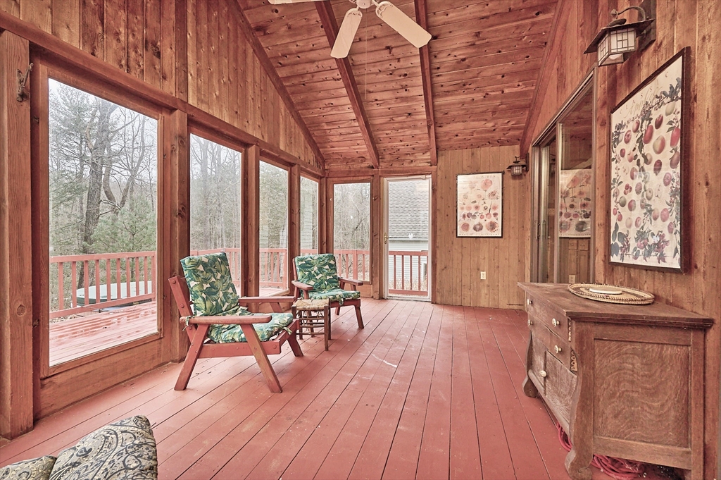 130 Coles Meadow Road Northampton, MA 01060 - Photo 10 of 42 a view of a dining room with furniture wooden floor and a rug