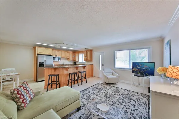 a living room with furniture and a table