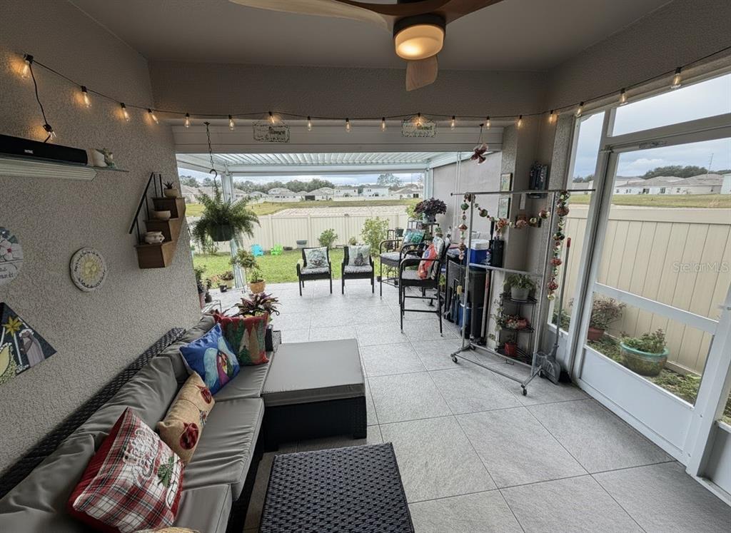9611 Rampart Road Leesburg, FL 34788 - Photo 16 of 24 a living room filled with furniture