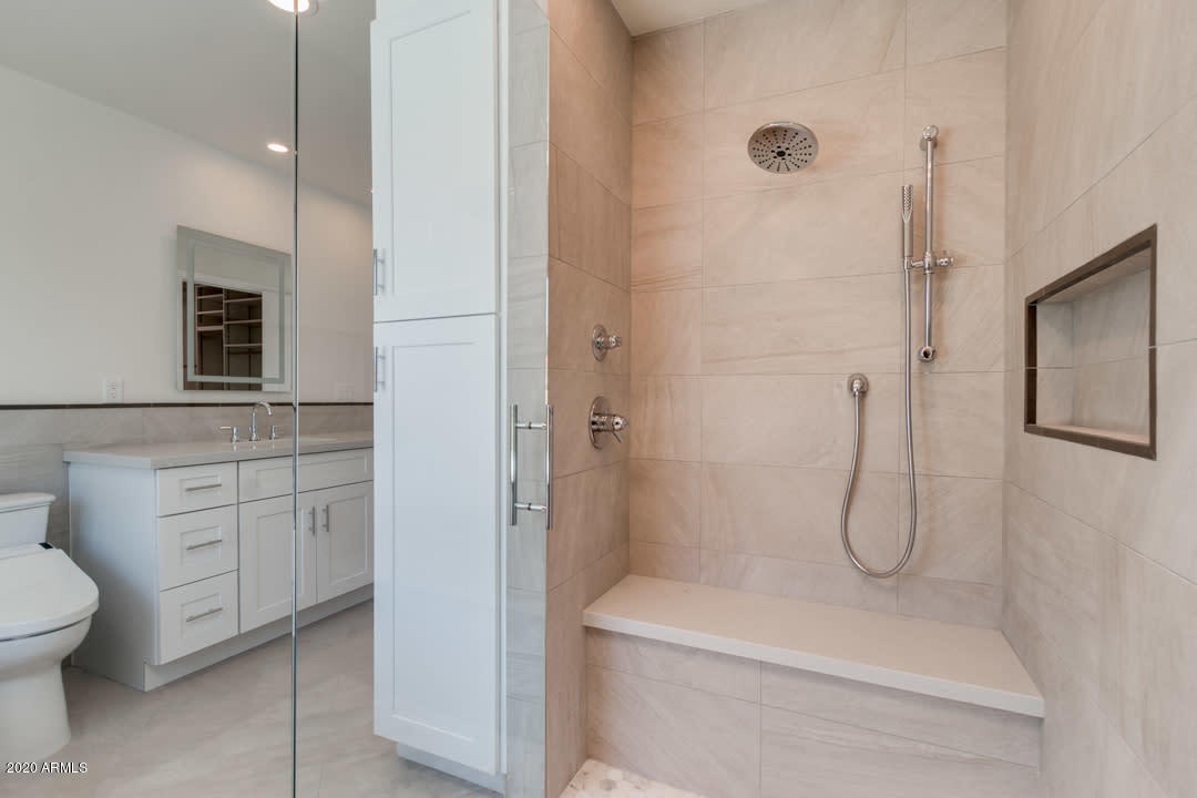 7475 East Raintree Court Scottsdale, AZ 85258 - Photo 18 of 38 a bathroom with a toilet sink and shower