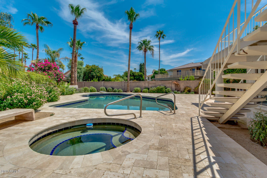 7475 East Raintree Court Scottsdale, AZ 85258 - Photo 33 of 38 a view of swimming pool with outdoor seating and plants