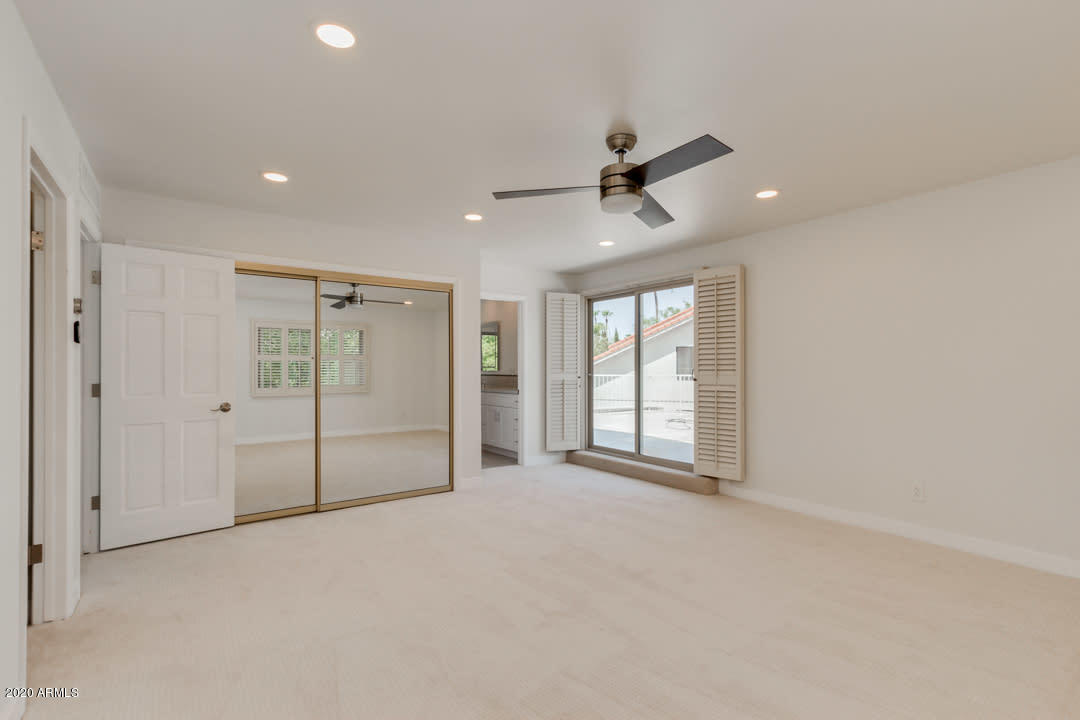 7475 East Raintree Court Scottsdale, AZ 85258 - Photo 4 of 38 a view of an empty room with a window