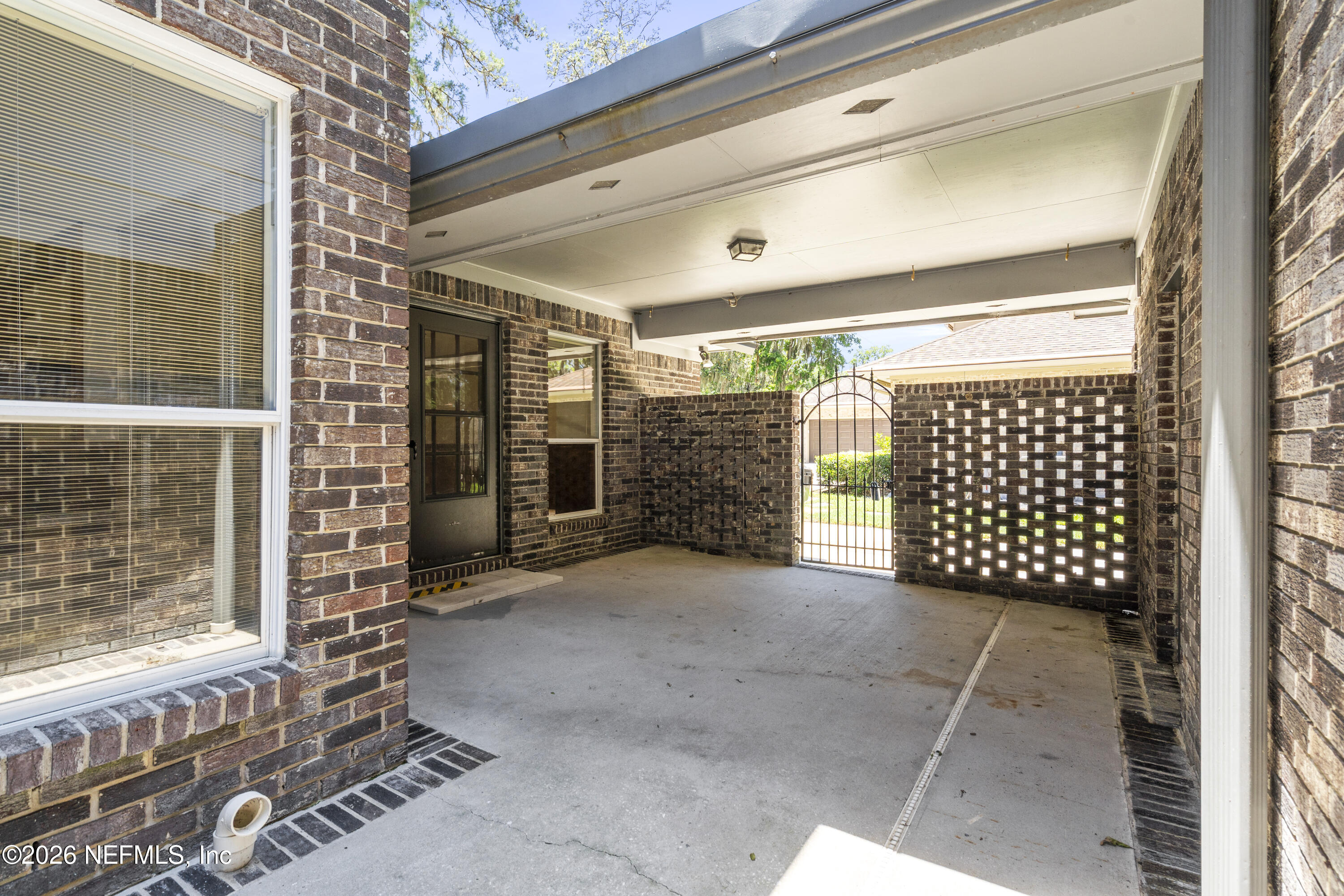 3154 Nautilus Road Middleburg, FL 32068 - Photo 42 of 61 Breezeway between Home & Garage