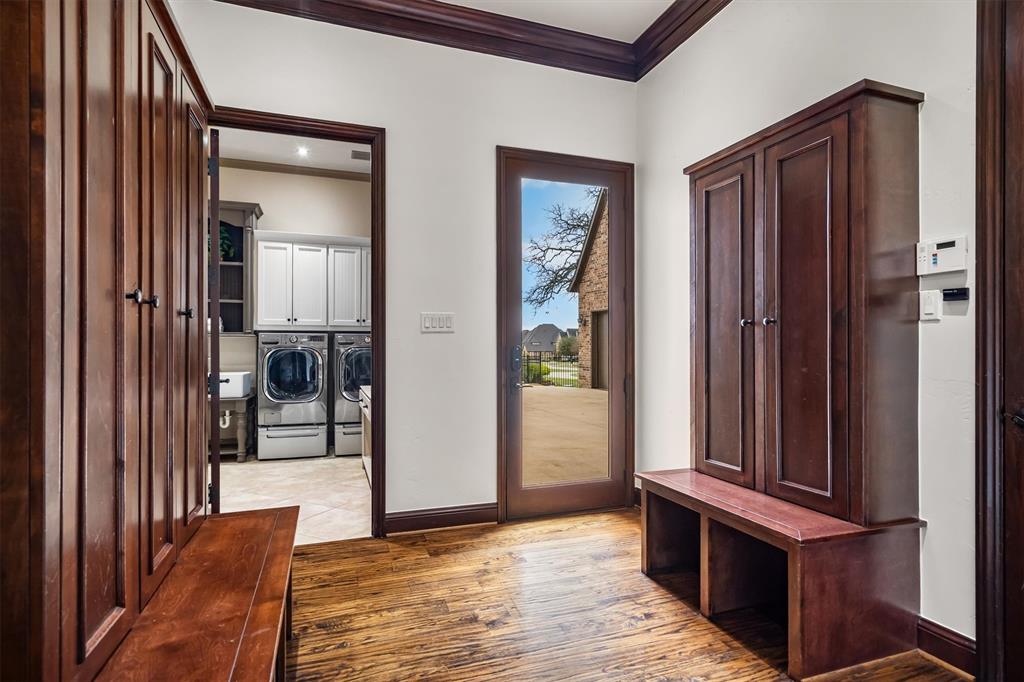 9 Victory Lane Double Oak, TX 75077 - Photo 15 of 40 Mudroom with built-in bench seating and storage helps keep everyday life organized. Located conveniently near the garage entry for effortless functionality.