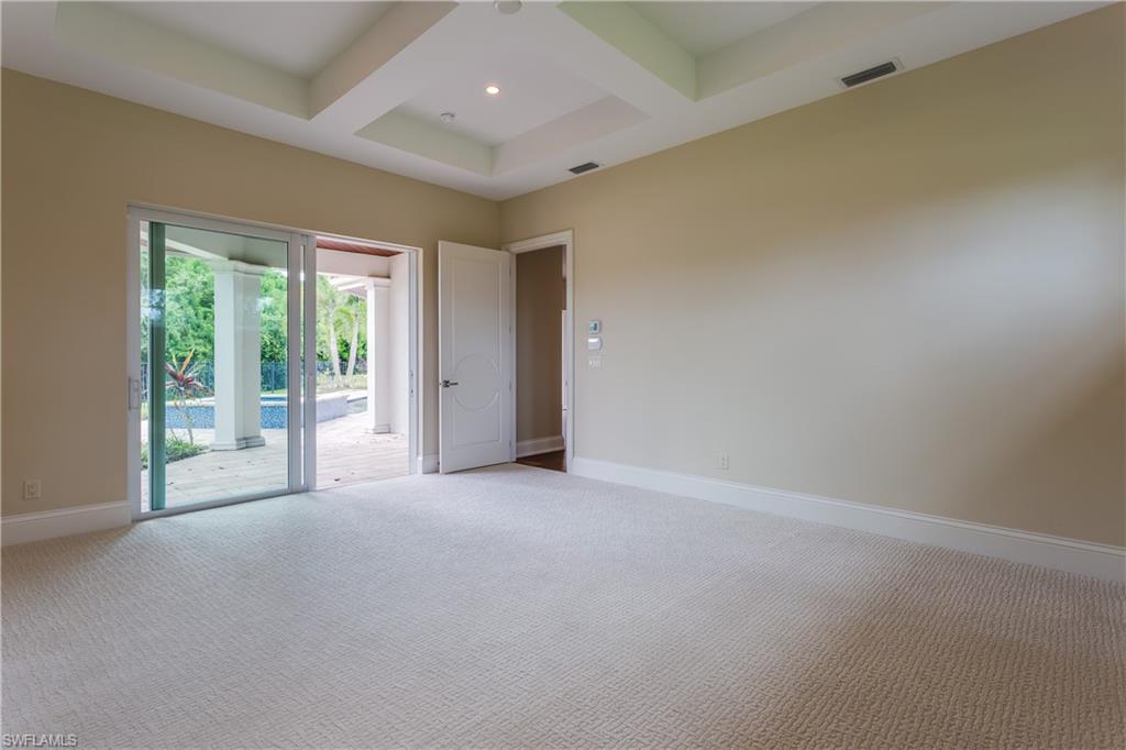 6578 Ridgewood Drive Naples, FL 34108 - Photo 16 of 35 a view of a livingroom with an empty space and balcony
