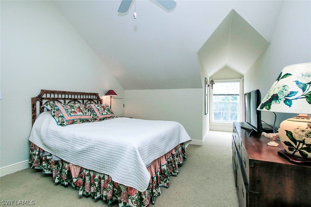 1358 Sand Castle Road Sanibel, FL 33957 - Photo 20 of 26 a bedroom with a bed and a window