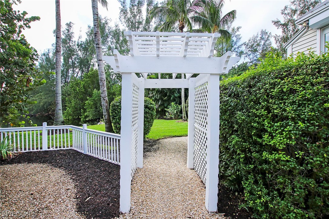 1358 Sand Castle Road Sanibel, FL 33957 - Photo 24 of 26 a view of a entrance gate of the house