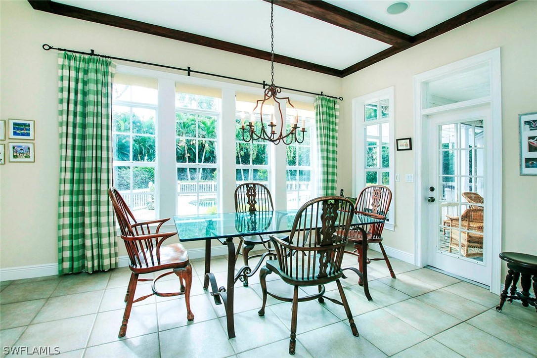 1358 Sand Castle Road Sanibel, FL 33957 - Photo 8 of 26 a view of a dining room with furniture window and outside view