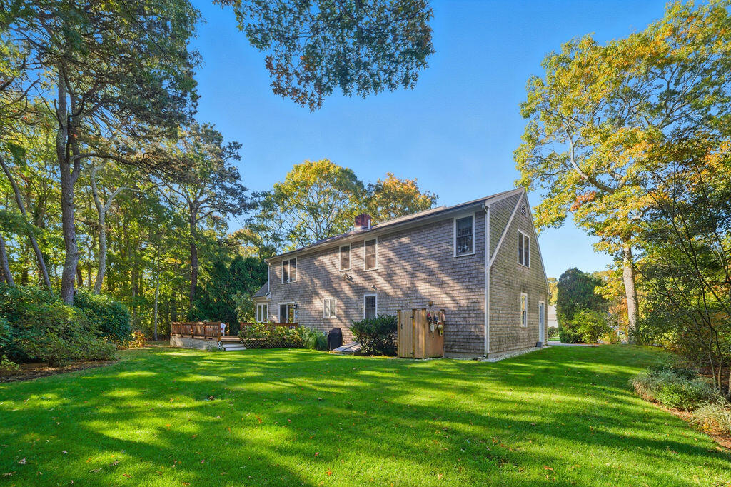 42 Eventide Lane Hyannis, MA 02601 - Photo 12 of 39 a view of a back yard of the house