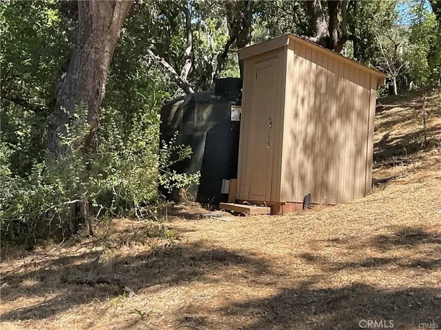 a backyard of a house with trees