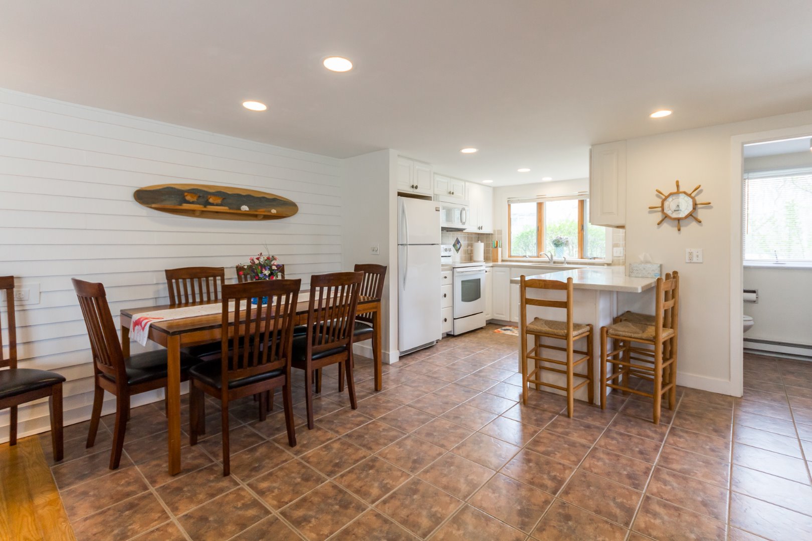 12 Mattakesett Bay Road, Unit M08 Edgartown, MA 02539 - Photo 3 of 40 Open design keeps everyone in the conversation.