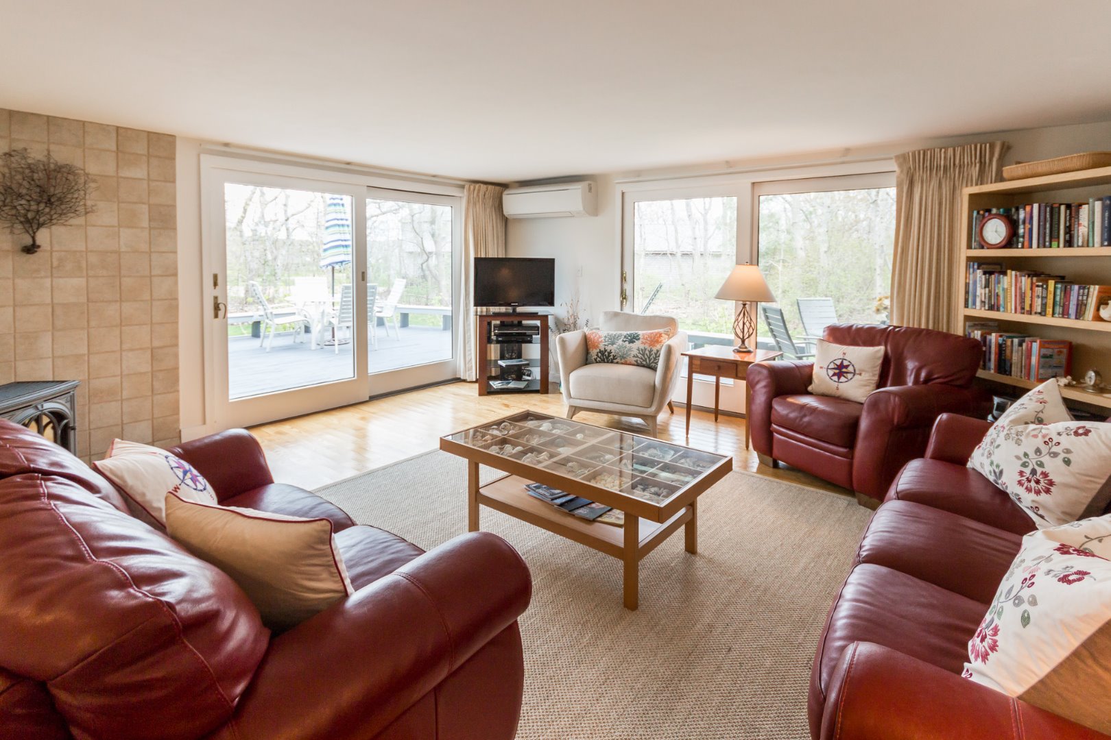 12 Mattakesett Bay Road, Unit M08 Edgartown, MA 02539 - Photo 6 of 40 Large living room with space for all and access to deck.