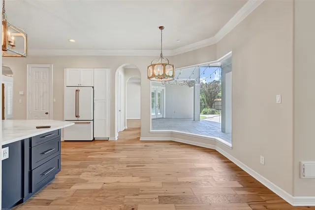 a view of a kitchen and a window