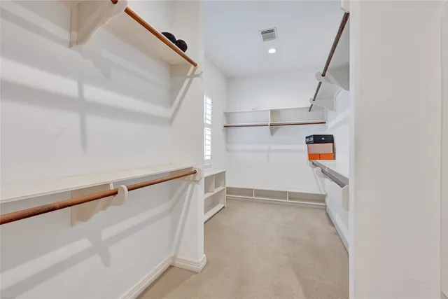 a view of storage and utility room with stairs