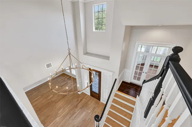 a view of an entryway with wooden floor