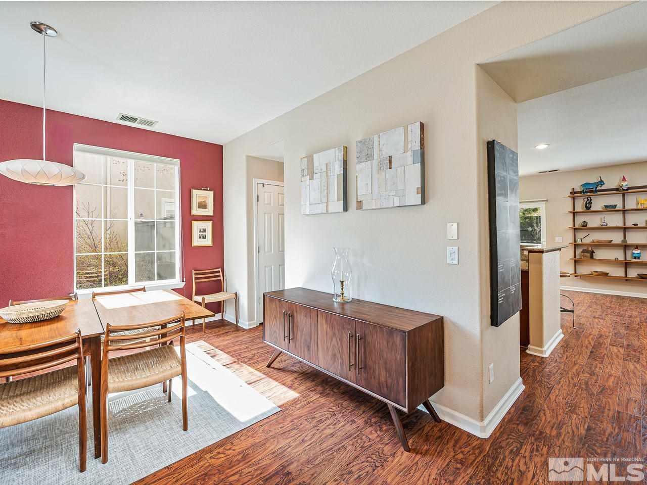 570 Little Sorrel Court Reno, NV 89521 - Photo 8 of 16 a living room with furniture and a wooden floor