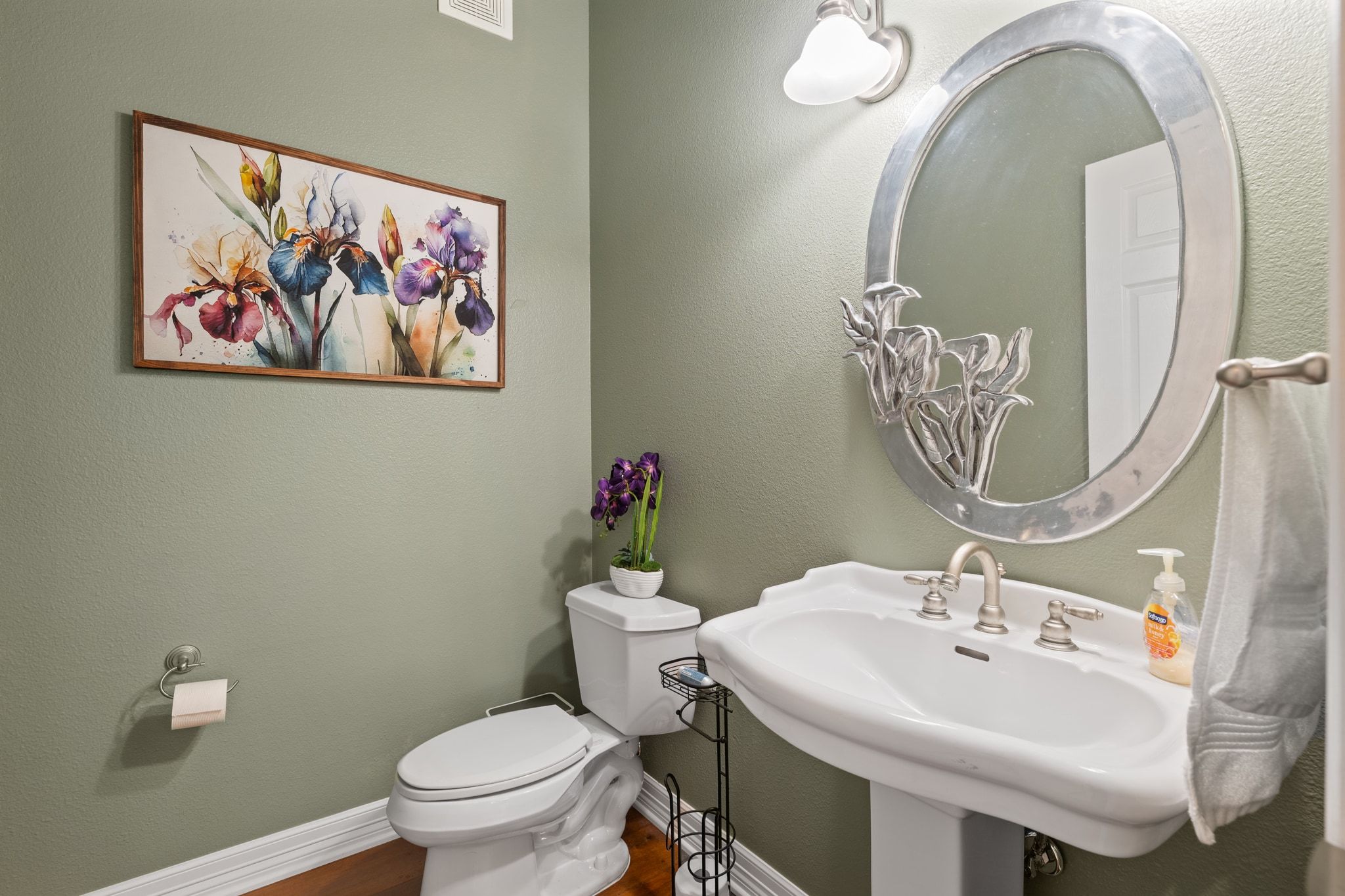 185 Shimmering Shore Court Spring Branch, TX 78070 - Photo 21 of 36 Half bath featuring a textured wall and wood finished floors