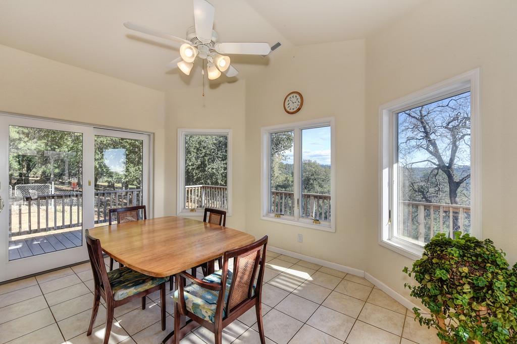 24200 Golden Ridge Drive Volcano, CA 95689 - Photo 18 of 59 a view of a dining room with furniture window and outside view