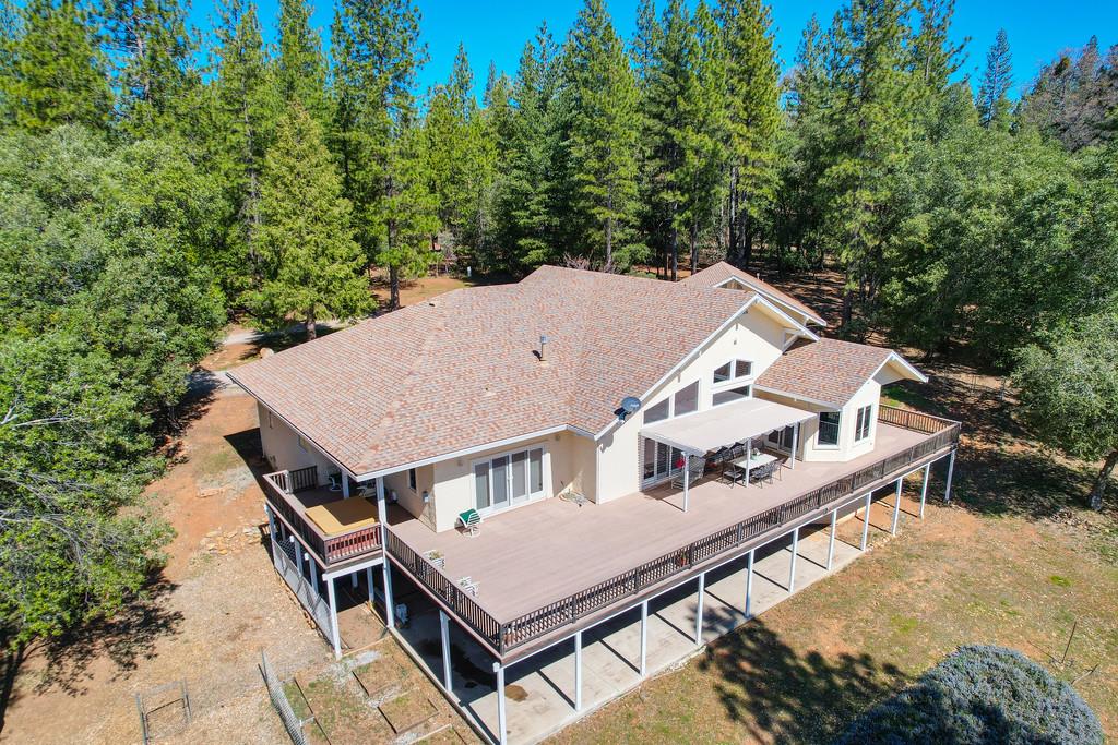 24200 Golden Ridge Drive Volcano, CA 95689 - Photo 4 of 58 an aerial view of a house with a yard and balcony