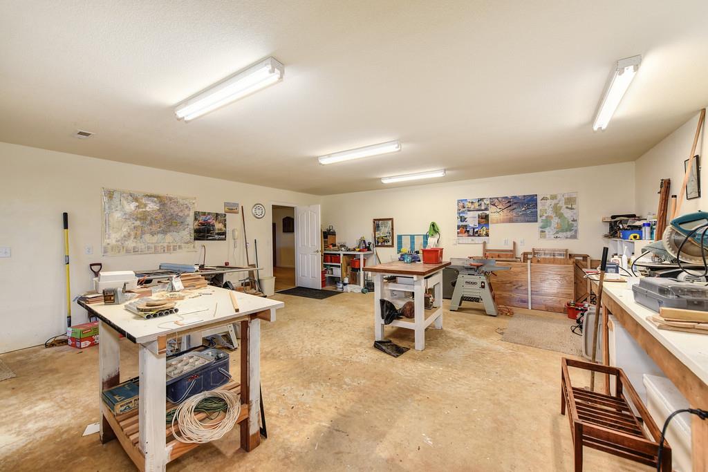 24200 Golden Ridge Drive Volcano, CA 95689 - Photo 51 of 58 a living room with furniture a table and chairs