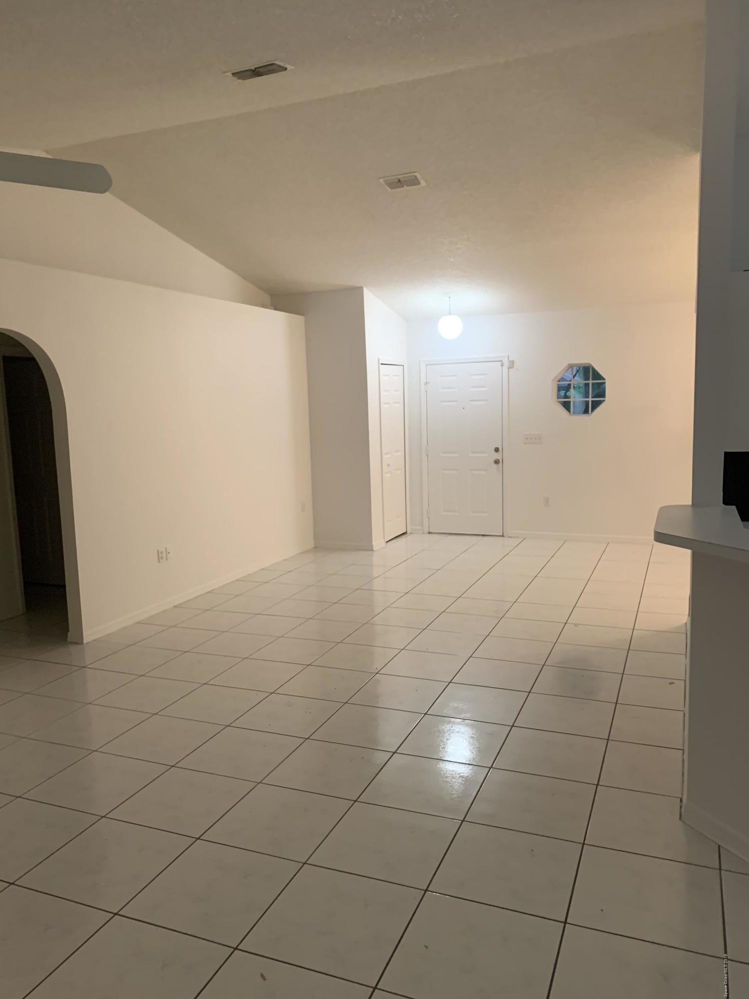 2023 Lansing Street Melbourne, FL 32935 - Photo 2 of 13 Entry and living room