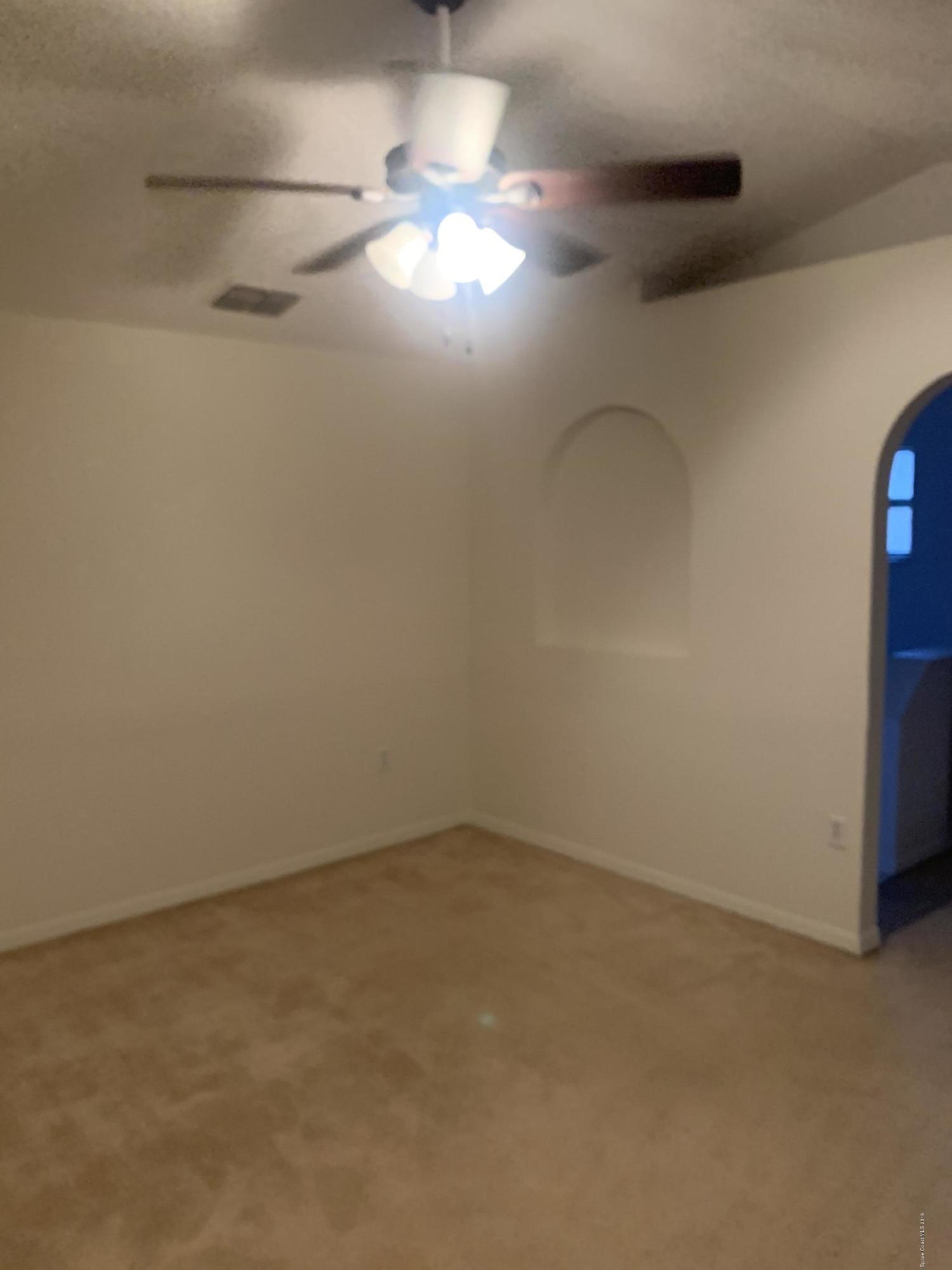 2023 Lansing Street Melbourne, FL 32935 - Photo 11 of 13 Master bedroom