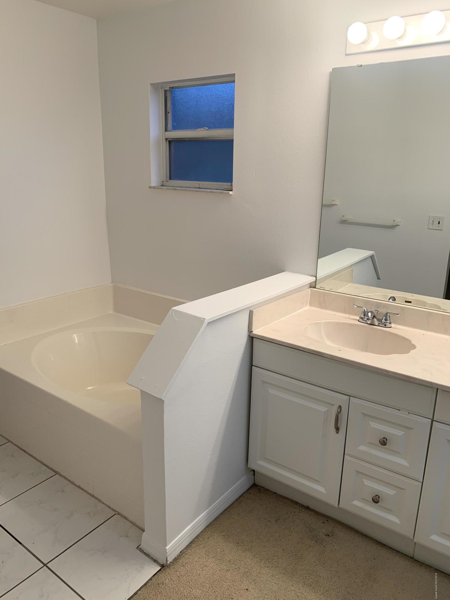 2023 Lansing Street Melbourne, FL 32935 - Photo 12 of 13 Master bathroom
