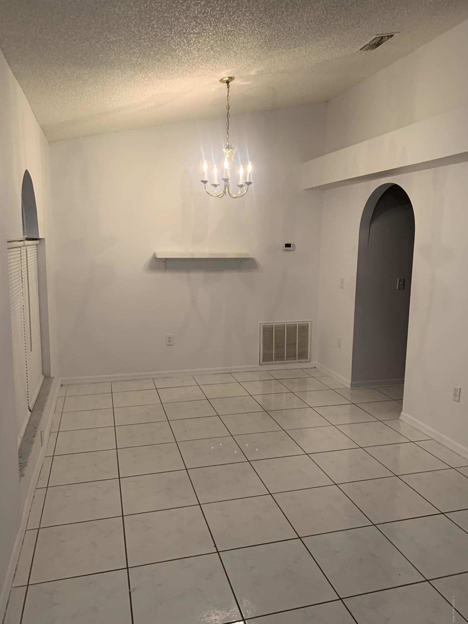 2023 Lansing Street Melbourne, FL 32935 - Photo 3 of 13 Dining area