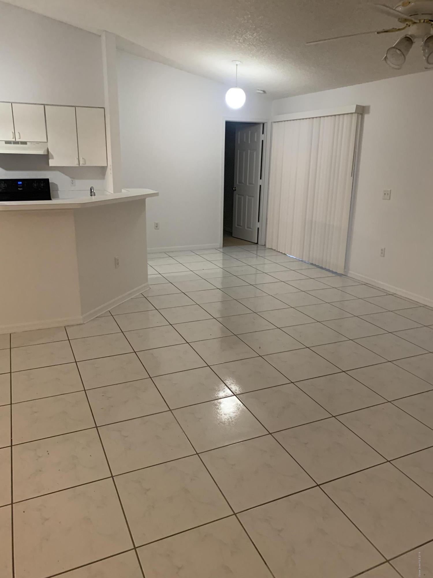 2023 Lansing Street Melbourne, FL 32935 - Photo 4 of 13 living kitchen area