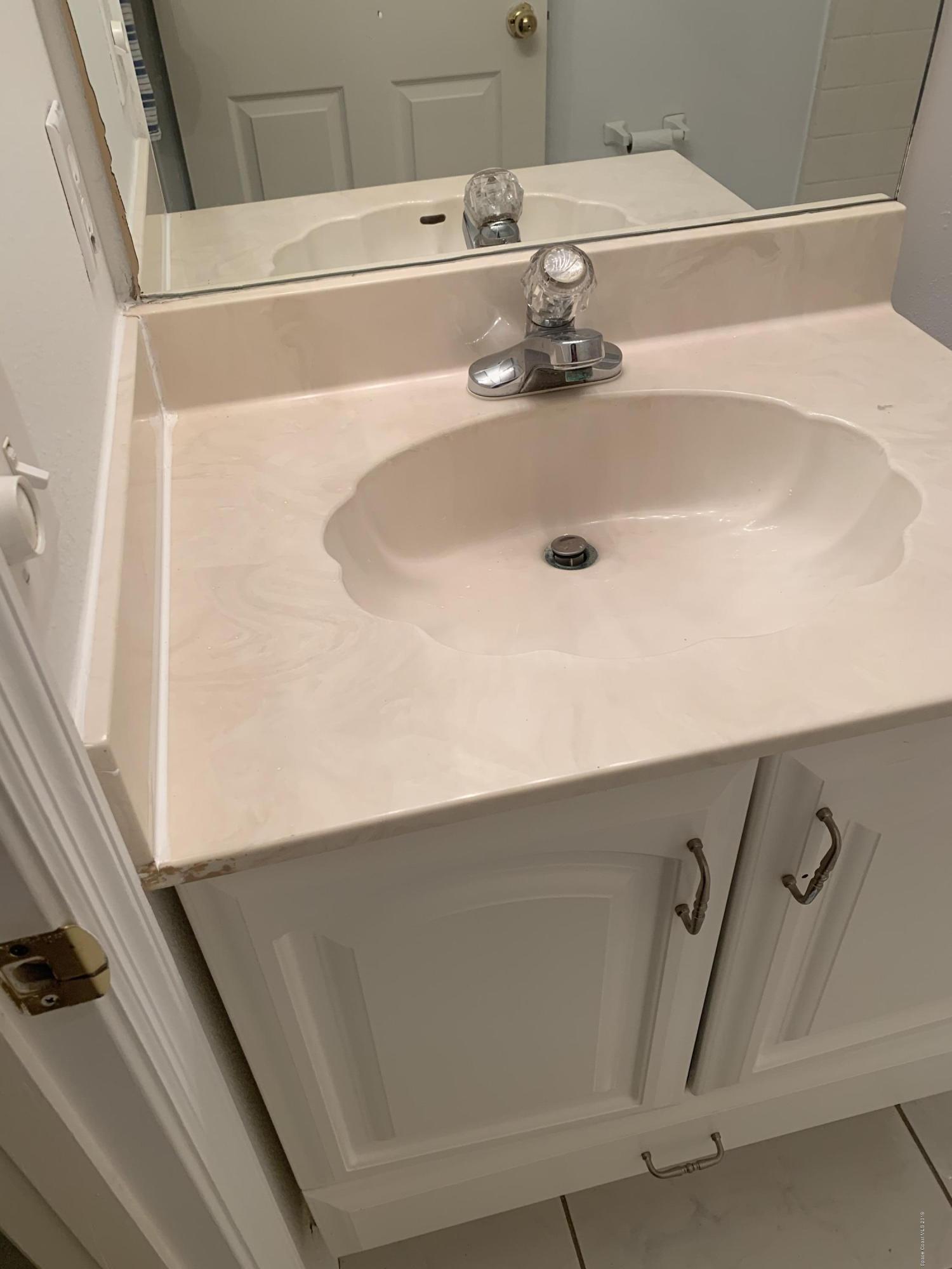 2023 Lansing Street Melbourne, FL 32935 - Photo 8 of 13 Hall bath