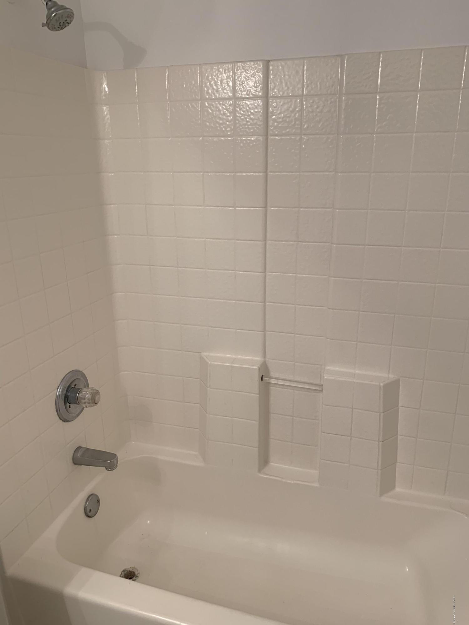 2023 Lansing Street Melbourne, FL 32935 - Photo 9 of 13 Hall bathtub