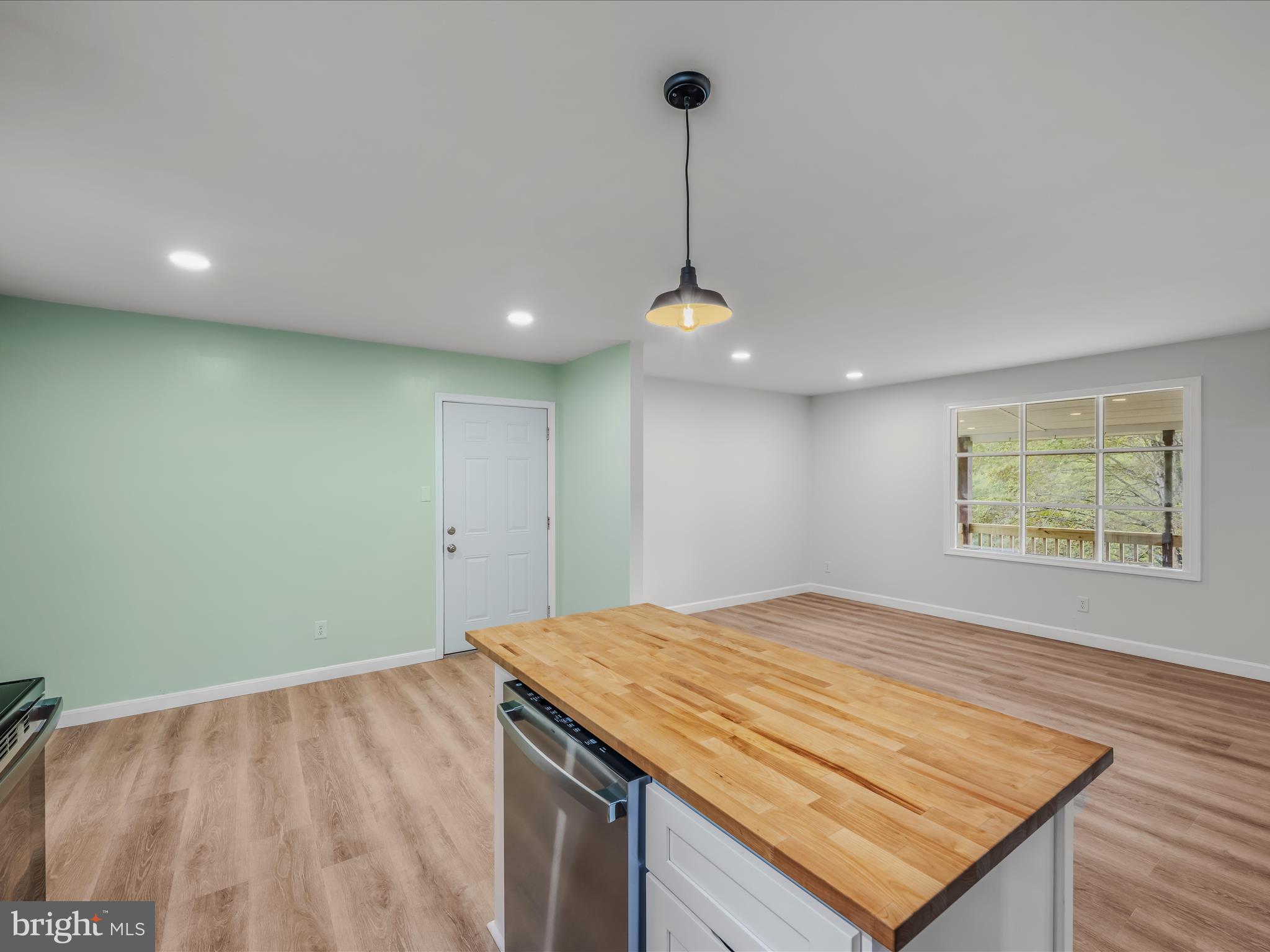 3939 Virginia Line Road Berkeley Springs, WV 25411 - Photo 11 of 51 a view of kitchen and utility room