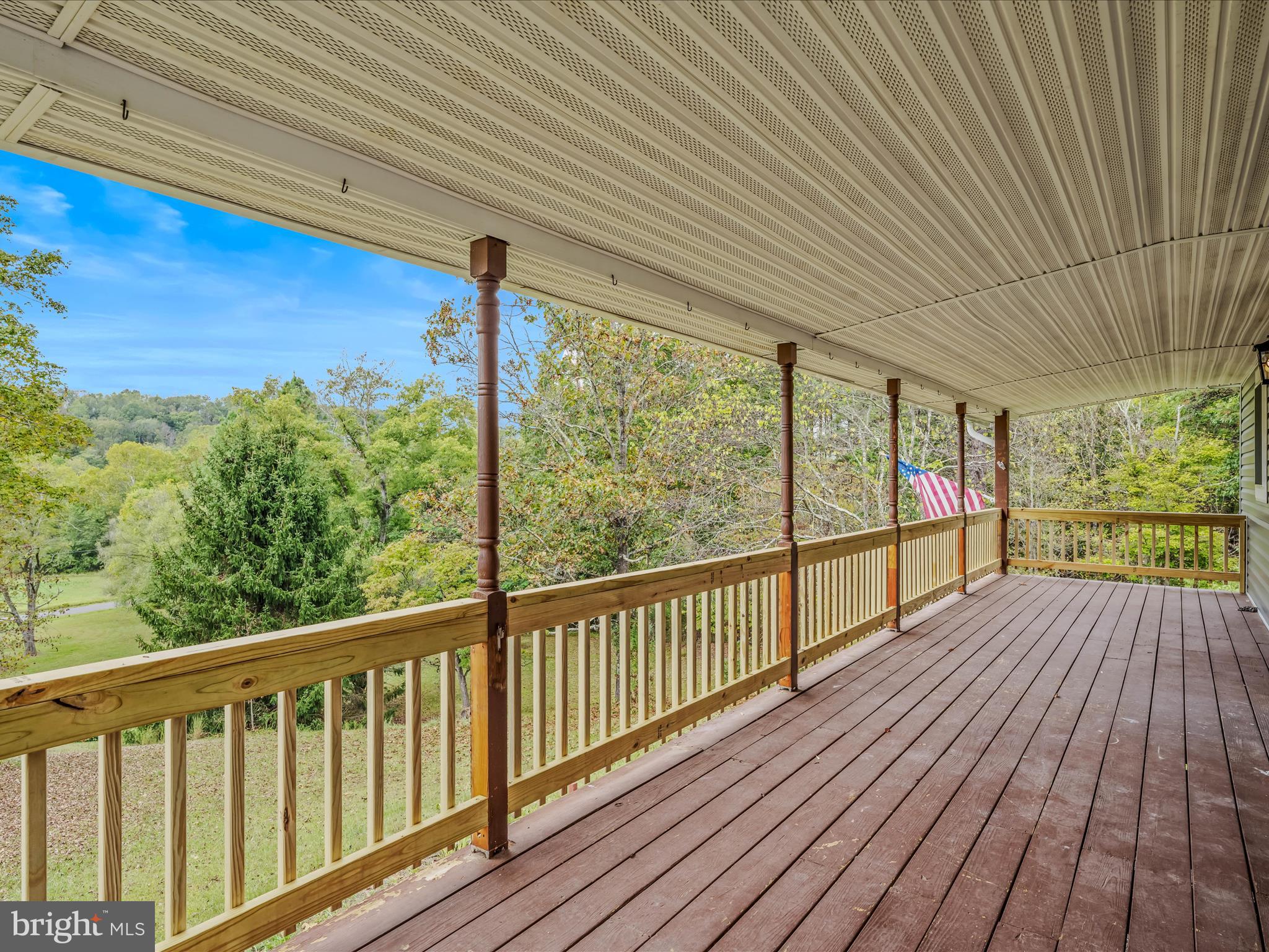 3939 Virginia Line Road Berkeley Springs, WV 25411 - Photo 13 of 51 a view of balcony with wooden floor
