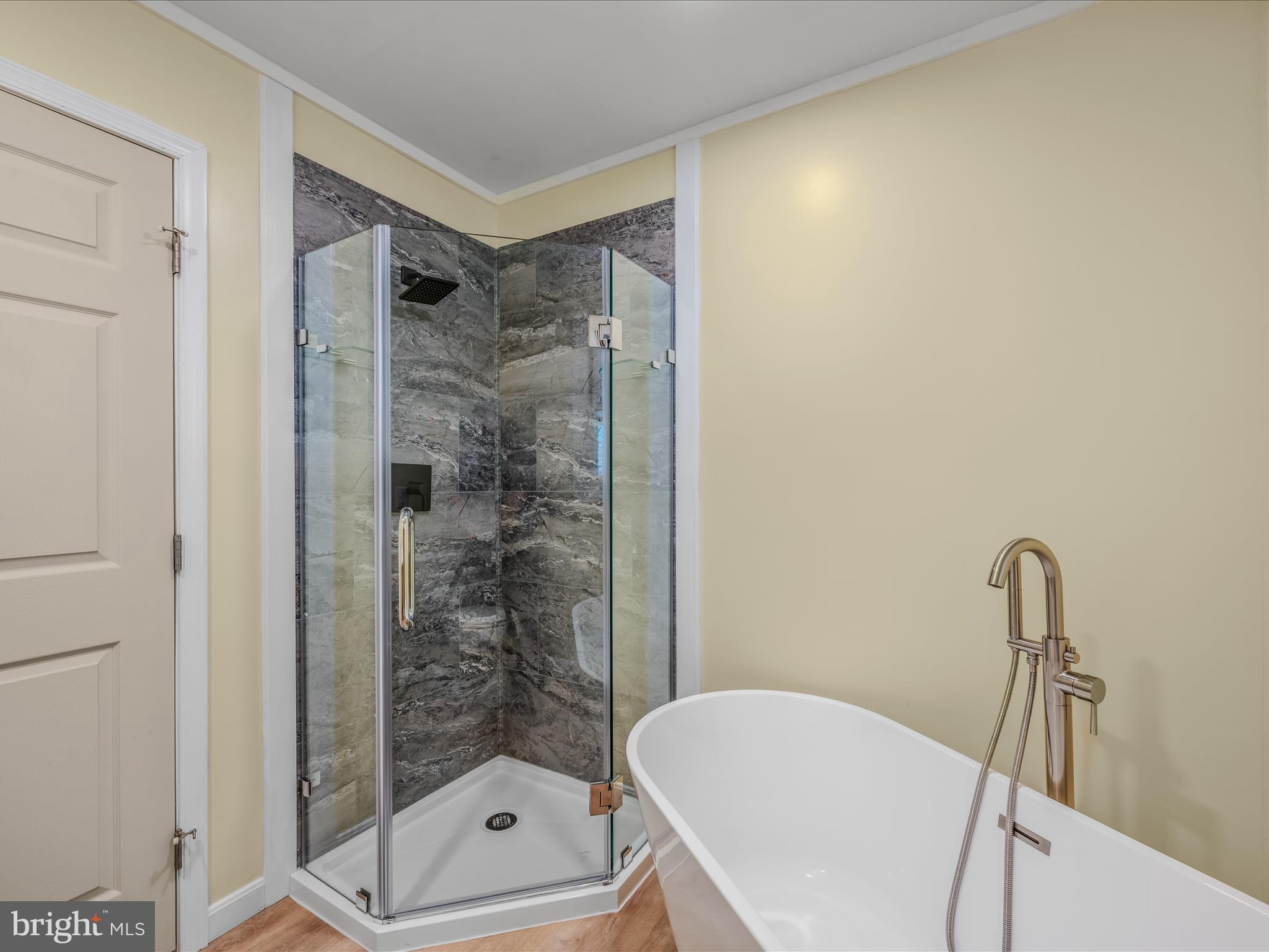 3939 Virginia Line Road Berkeley Springs, WV 25411 - Photo 18 of 51 a bathroom with a shower and a toilet