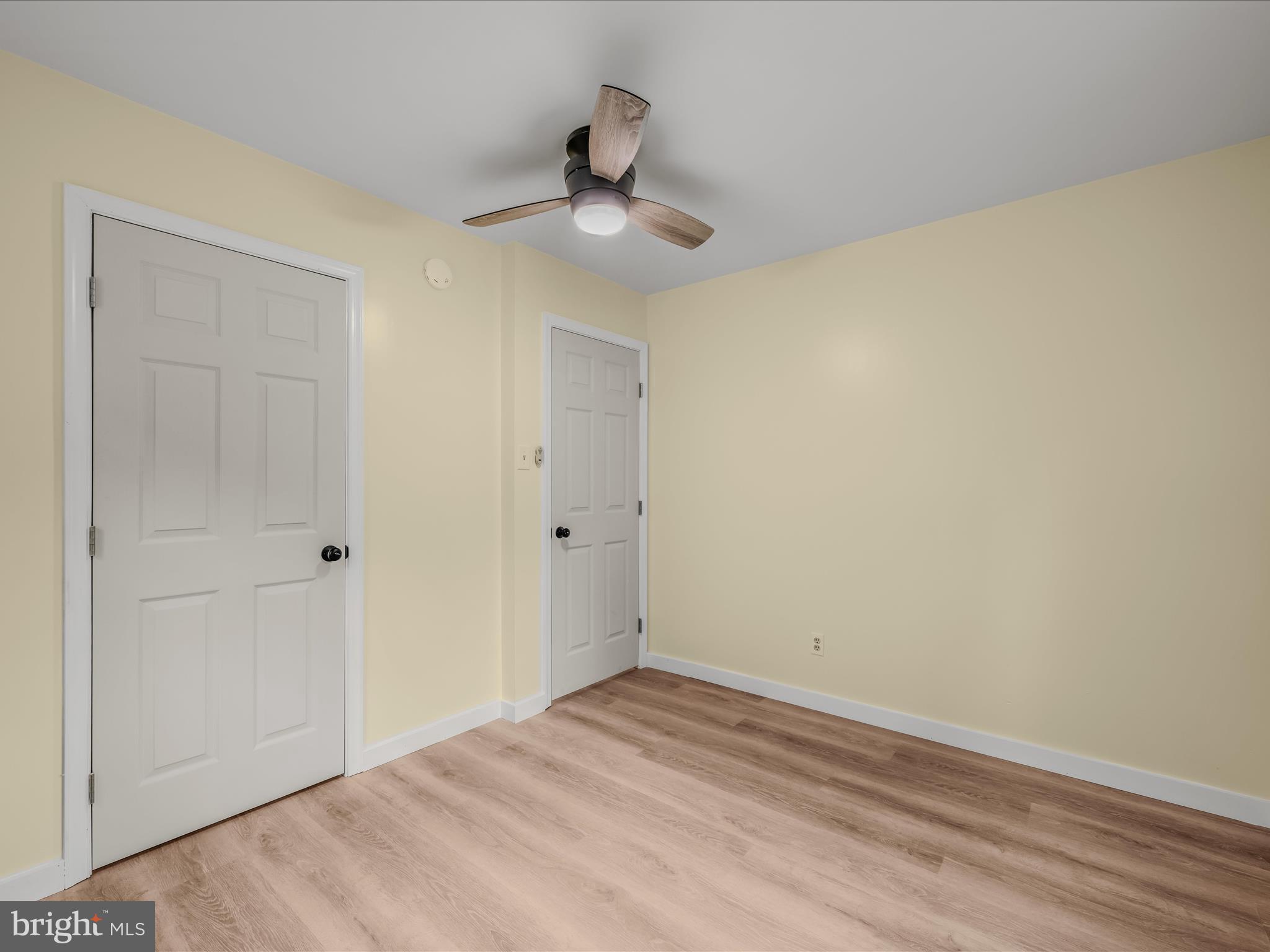 3939 Virginia Line Road Berkeley Springs, WV 25411 - Photo 21 of 51 a view of empty room with wooden floor