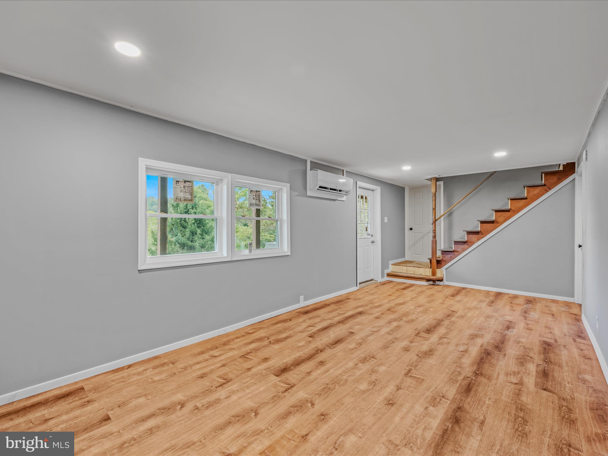 3939 Virginia Line Road Berkeley Springs, WV 25411 - Photo 23 of 51 a view of an empty room and window