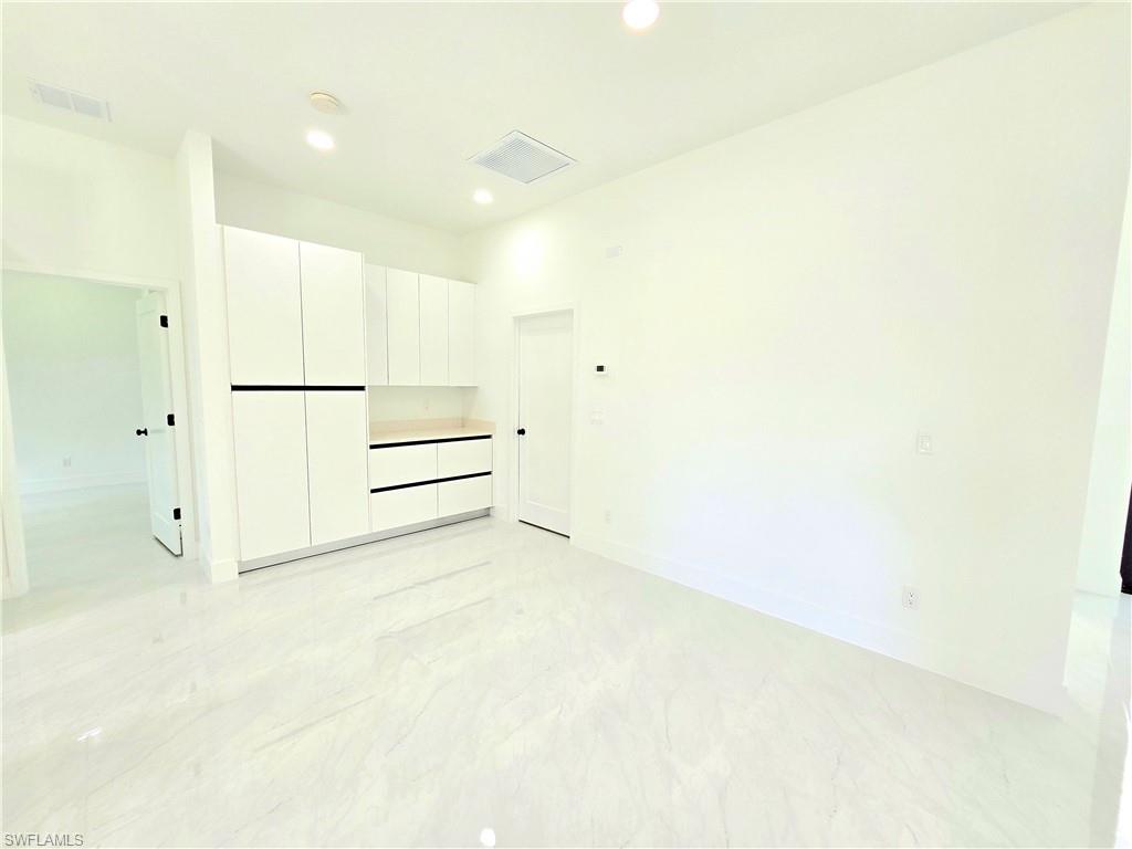 2522 Alice Place Lehigh Acres, FL 33971 - Photo 12 of 34 a view of an empty room