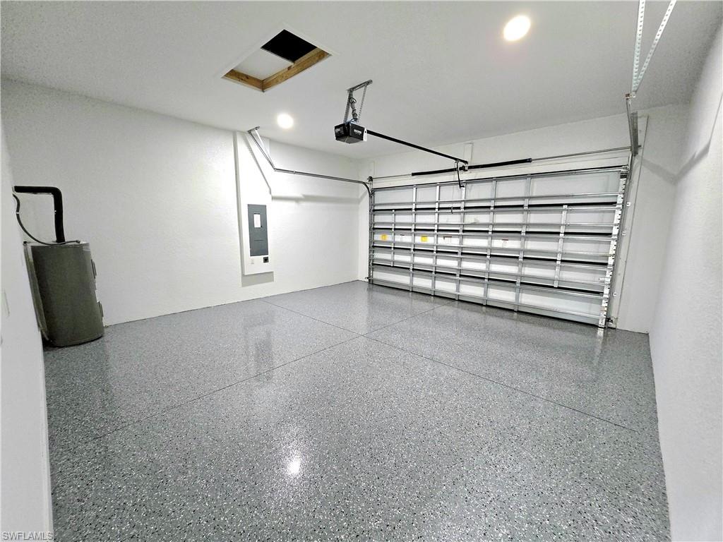 2522 Alice Place Lehigh Acres, FL 33971 - Photo 28 of 34 a view of an empty garage