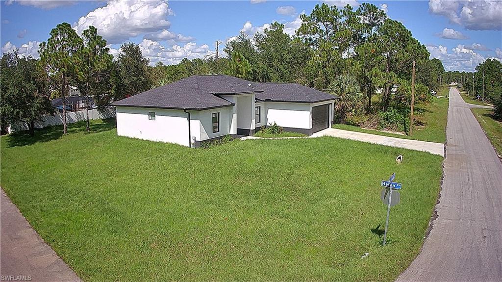 2522 Alice Place Lehigh Acres, FL 33971 - Photo 34 of 34 a aerial view of a house