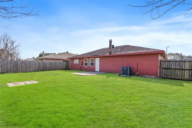 a view of a yard in front of a house
