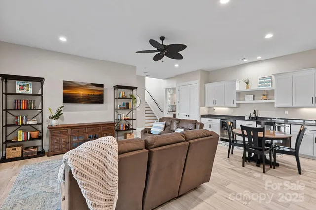 a kitchen with stainless steel appliances granite countertop a sink and cabinets