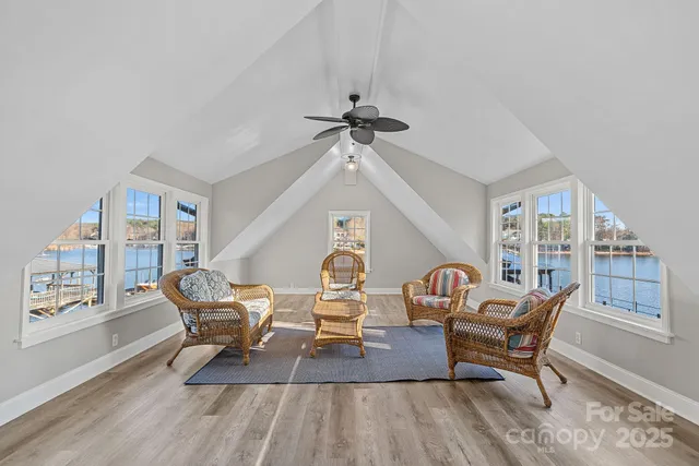 a view of a livingroom with furniture and toys
