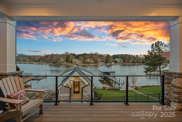 a view of a lake with a garden and trees